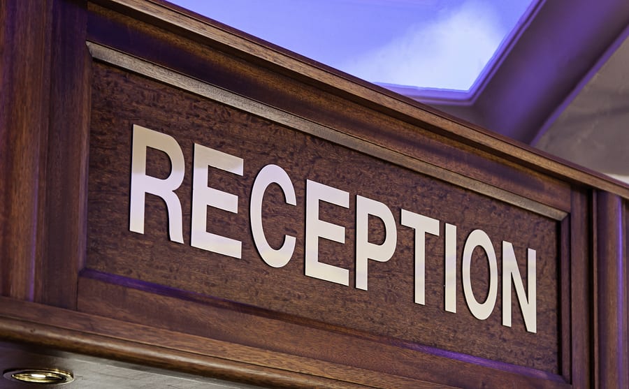 Golden reception bell and reception sign